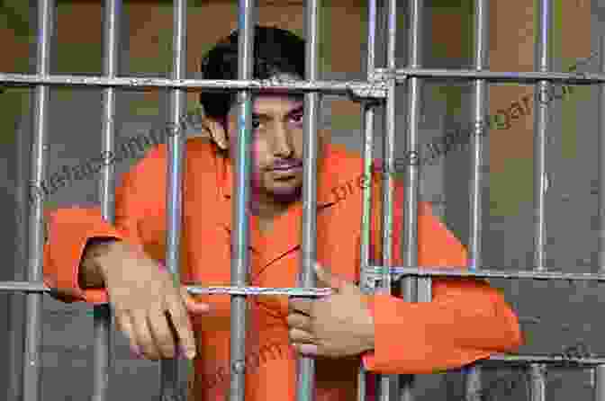 A Man In A Prison Uniform Sitting In A Cell Non Negotiable: Ten Years Incarcerated Creating The Unbreakable Mindset