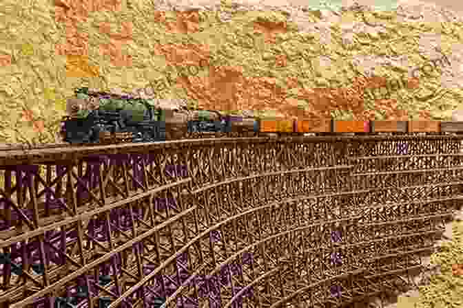 A Steam Locomotive Pulling A Train Through A Rugged Canyon On The San Diego And Arizona Eastern Railway. SAN DIEGO AND ARIZONA EASTERN Motive Power And Equipment