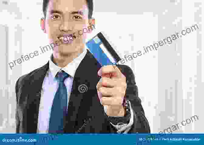 Image Of A Businessman Holding A Credit Card And Smiling Start Up: Insider Secrets On Building Your Business Credit